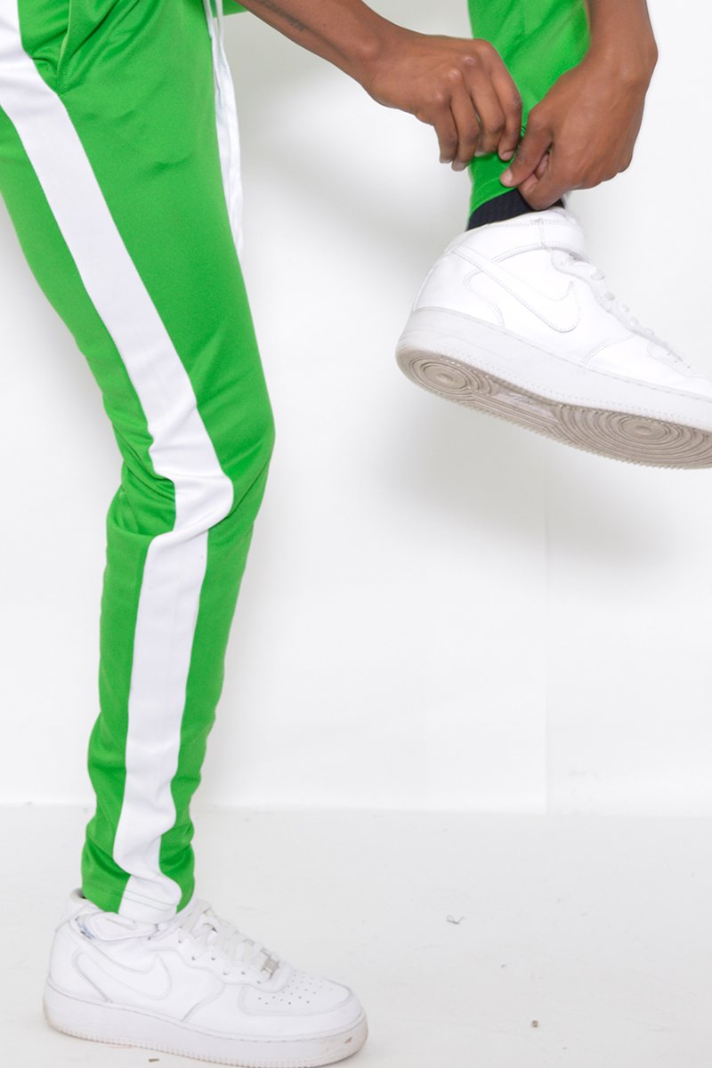 Classic Slim Fit Track Pants featuring a single stripe detail and hidden ankle zipper, designed for comfort and style.