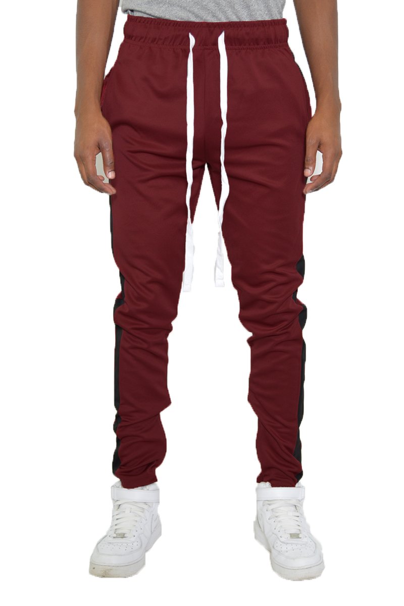 Classic Slim Fit Track Pants featuring a single stripe detail, tug-free zipper closure, and hidden ankle zipper, made from polyester and spandex.