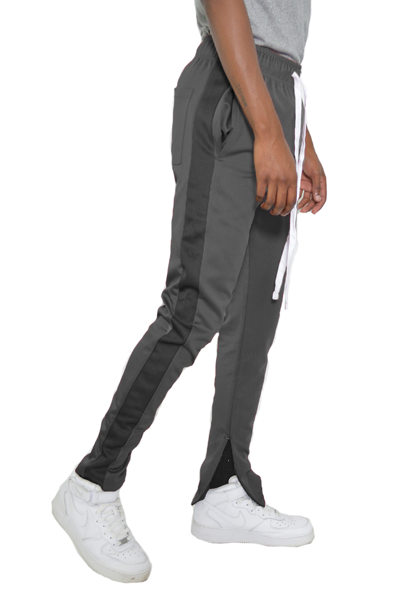 Classic slim fit track pants with single stripe detail and hidden ankle zipper, perfect for workouts and casual wear.