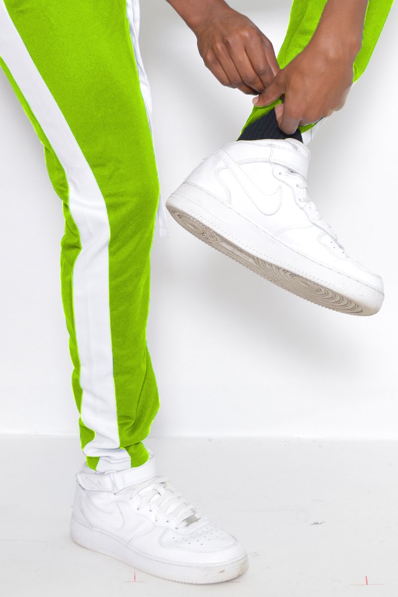 Classic Slim Fit Track Pants featuring a sleek design with a single stripe detail and hidden ankle zippers, perfect for workouts and casual wear.