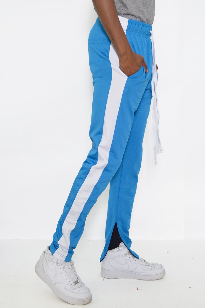 Classic Slim Fit Track Pants featuring a single stripe detail, tug-free zipper closure, and hidden ankle zipper, made from polyester and spandex.