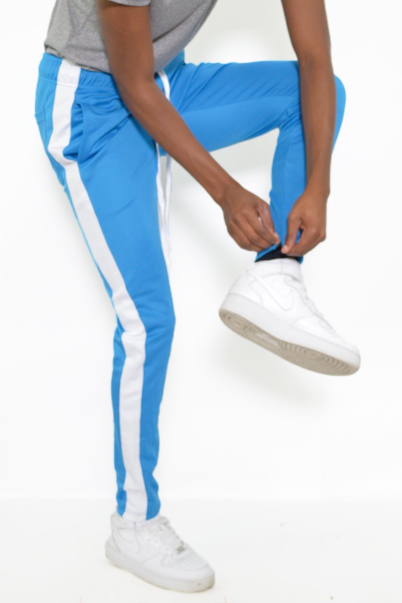 Classic Slim Fit Track Pants featuring a single stripe detail, tug-free zipper closure, and hidden ankle zipper, made from polyester and spandex.