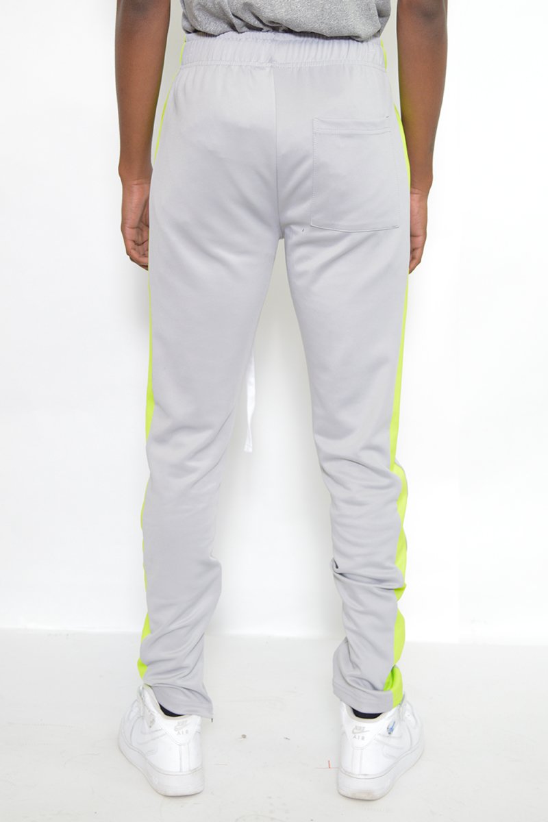 Classic Slim Fit Track Pants featuring a sleek design with single stripe detail and hidden ankle zippers, perfect for active lifestyles.