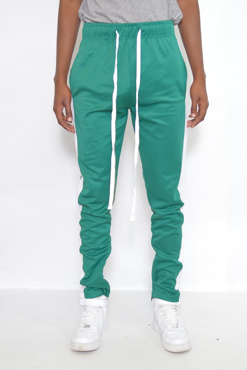 Classic slim fit track pants featuring an elastic waist, ankle zippers, and multiple pockets for convenience.