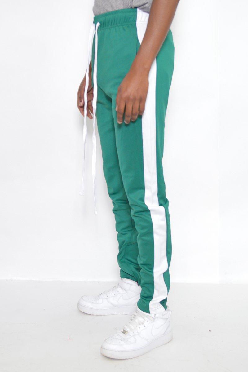 Classic slim fit track pants featuring an elastic waist, ankle zippers, and multiple pockets for convenience.