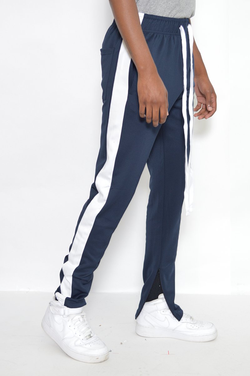 Classic Slim Fit Track Pants featuring a sleek design with a single stripe detail and hidden ankle zippers, perfect for active wear.