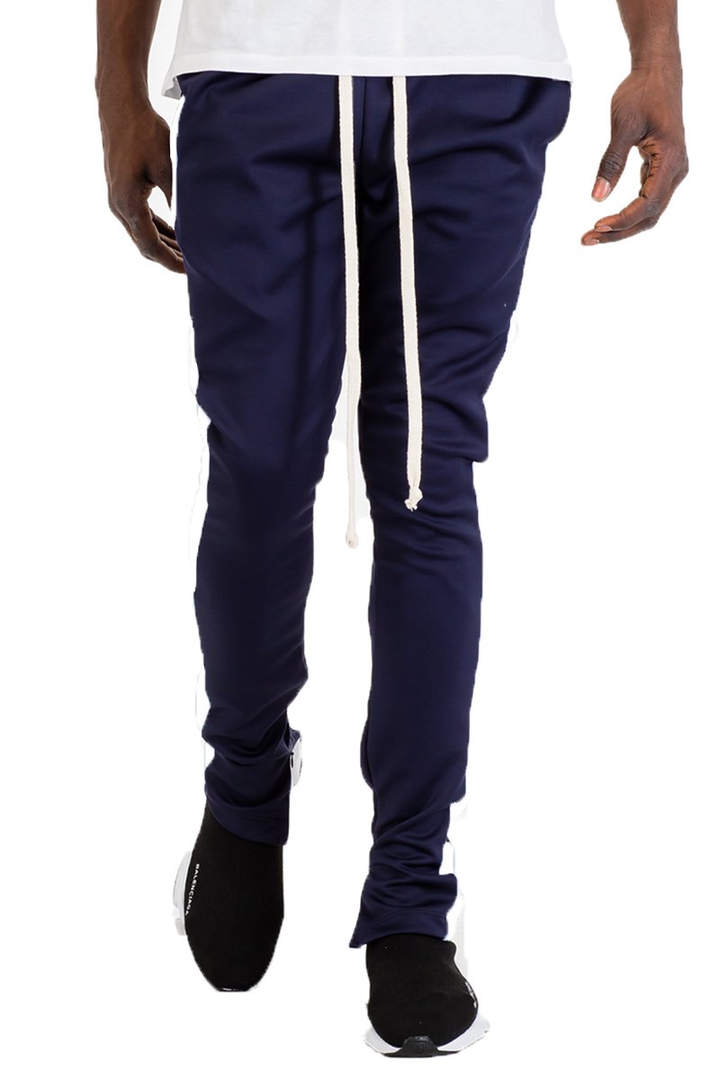 Classic Slim Fit Track Pants in Navy and White with hidden ankle zippers and standard pockets.