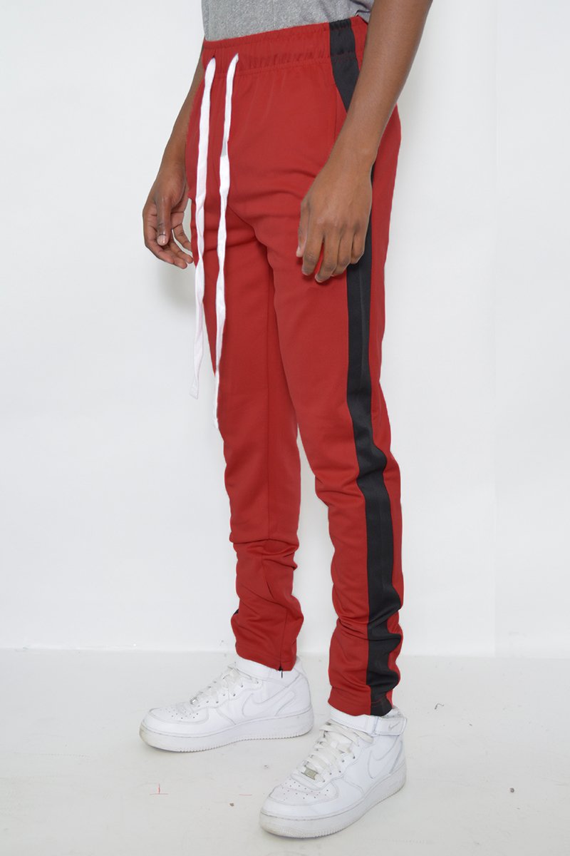 Classic Slim Fit Track Pants featuring a single stripe detail and hidden ankle zipper, designed for comfort and style.