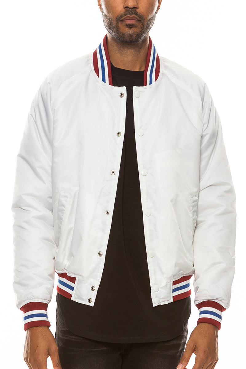 A stylish Classic Varsity Windbreaker featuring snap button closure and striped elastic details, perfect for casual wear.