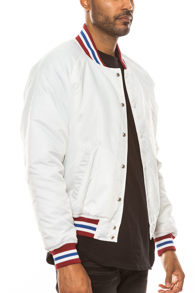 A stylish Classic Varsity Windbreaker featuring snap button closure and striped elastic details, perfect for casual wear.