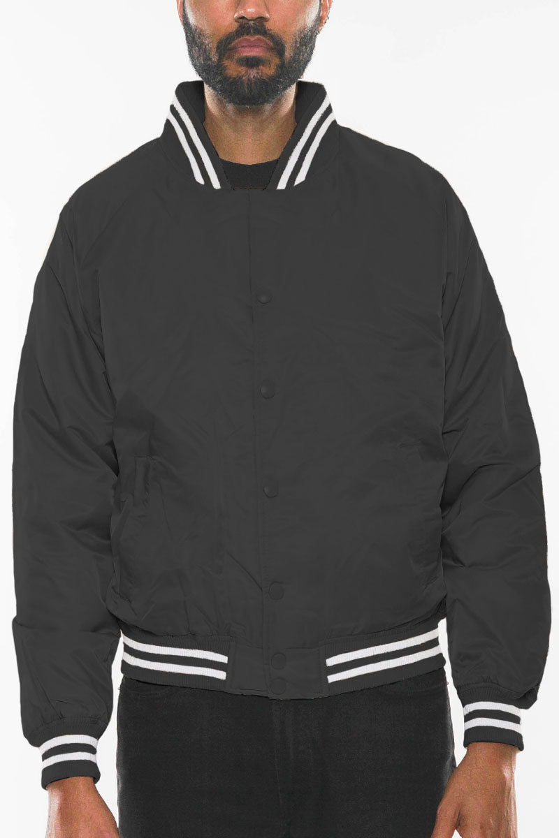 A stylish Classic Varsity Windbreaker featuring snap button closure and striped elastic details, perfect for casual wear.