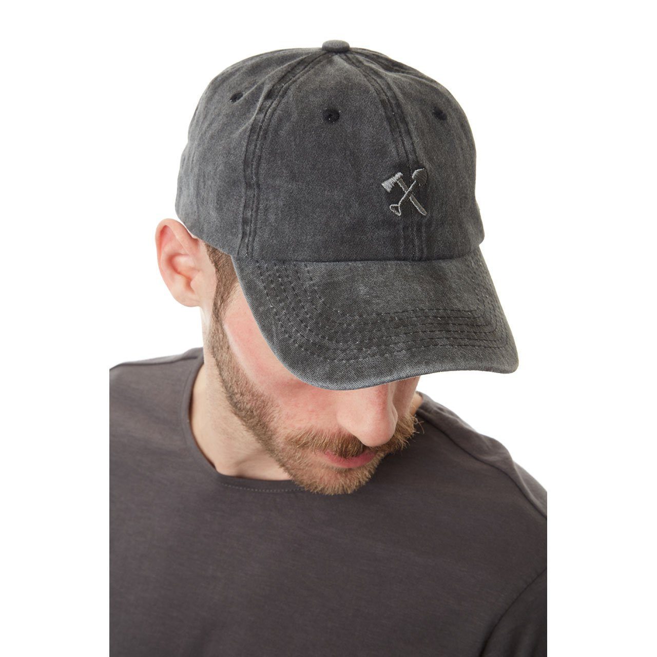 Cody Dad Hat featuring a curved brim, snow-washed finish, and embroidered shovel and ax logo, designed for comfort and style.