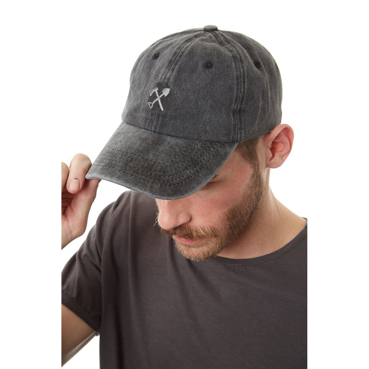 Cody Dad Hat featuring a curved brim, snow-washed finish, and embroidered shovel and ax logo, designed for comfort and style.