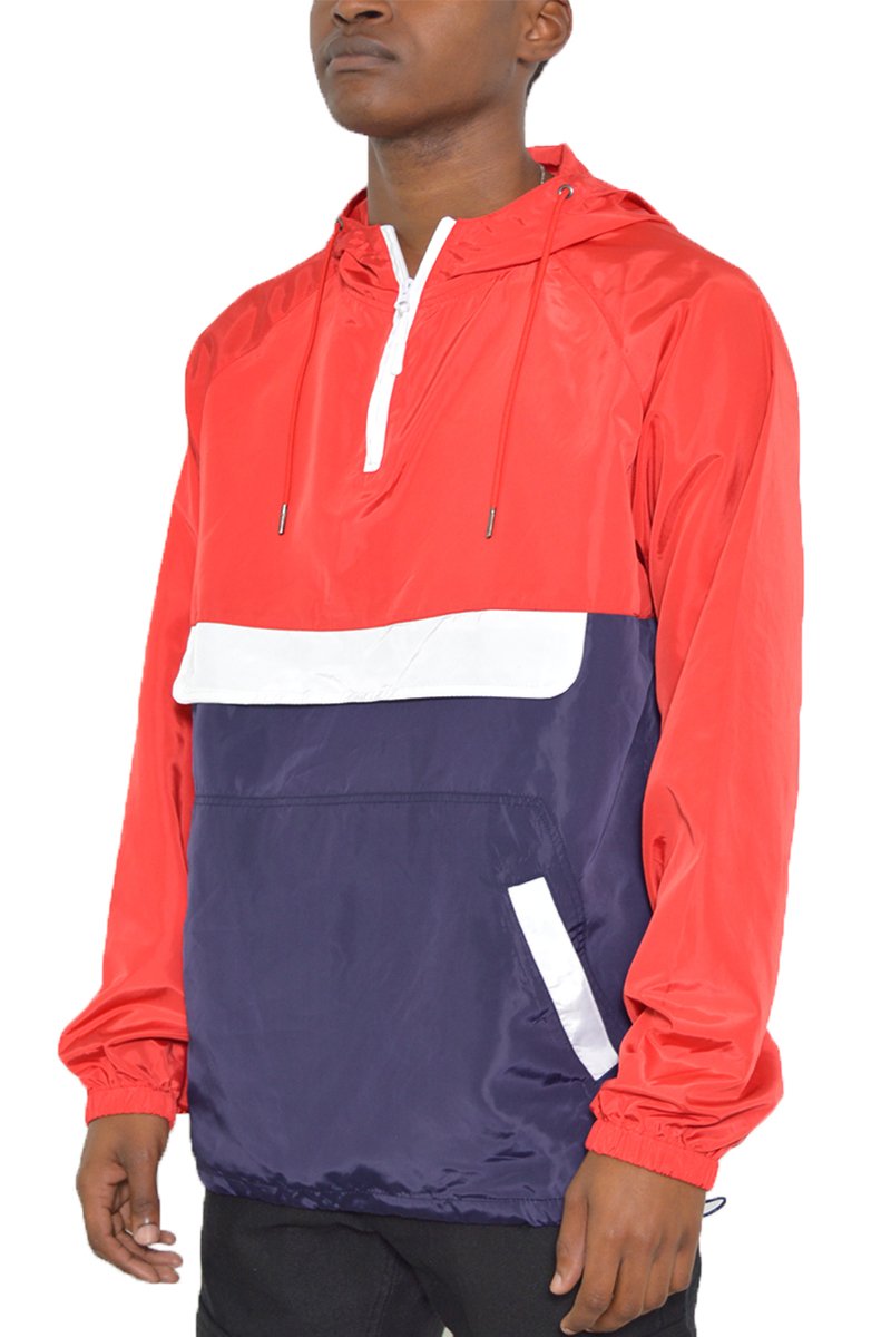 Color Block Anorak Jacket featuring a trendy design with flap pockets and quarter zip closure, modeled by a tall individual.