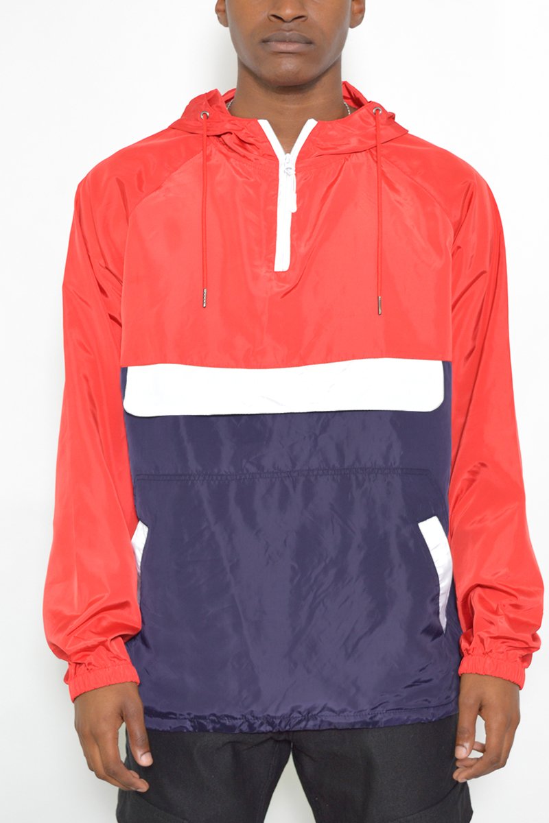 Color Block Anorak Jacket featuring a trendy design with flap pockets and quarter zip closure, modeled by a tall individual.