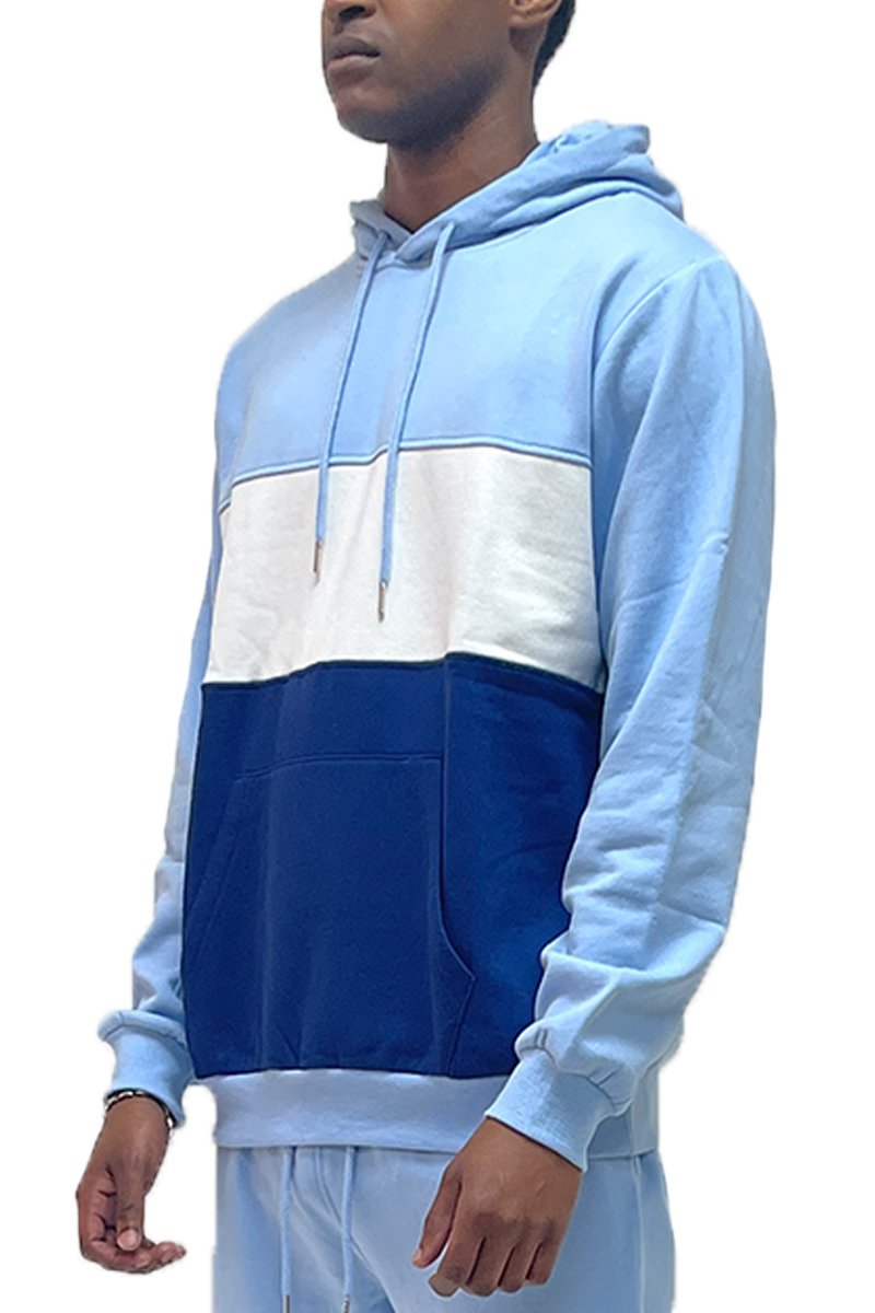 A stylish color block pullover hoodie featuring an adjustable drawstring hood, elastic ribbed waist, and cuffs, made from a soft cotton-polyester blend.