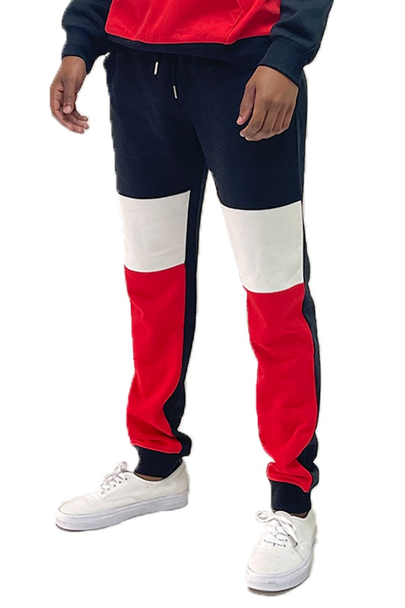 Color Block Sweats featuring an elastic waist and ribbed ankle cuffs, displayed on a model.