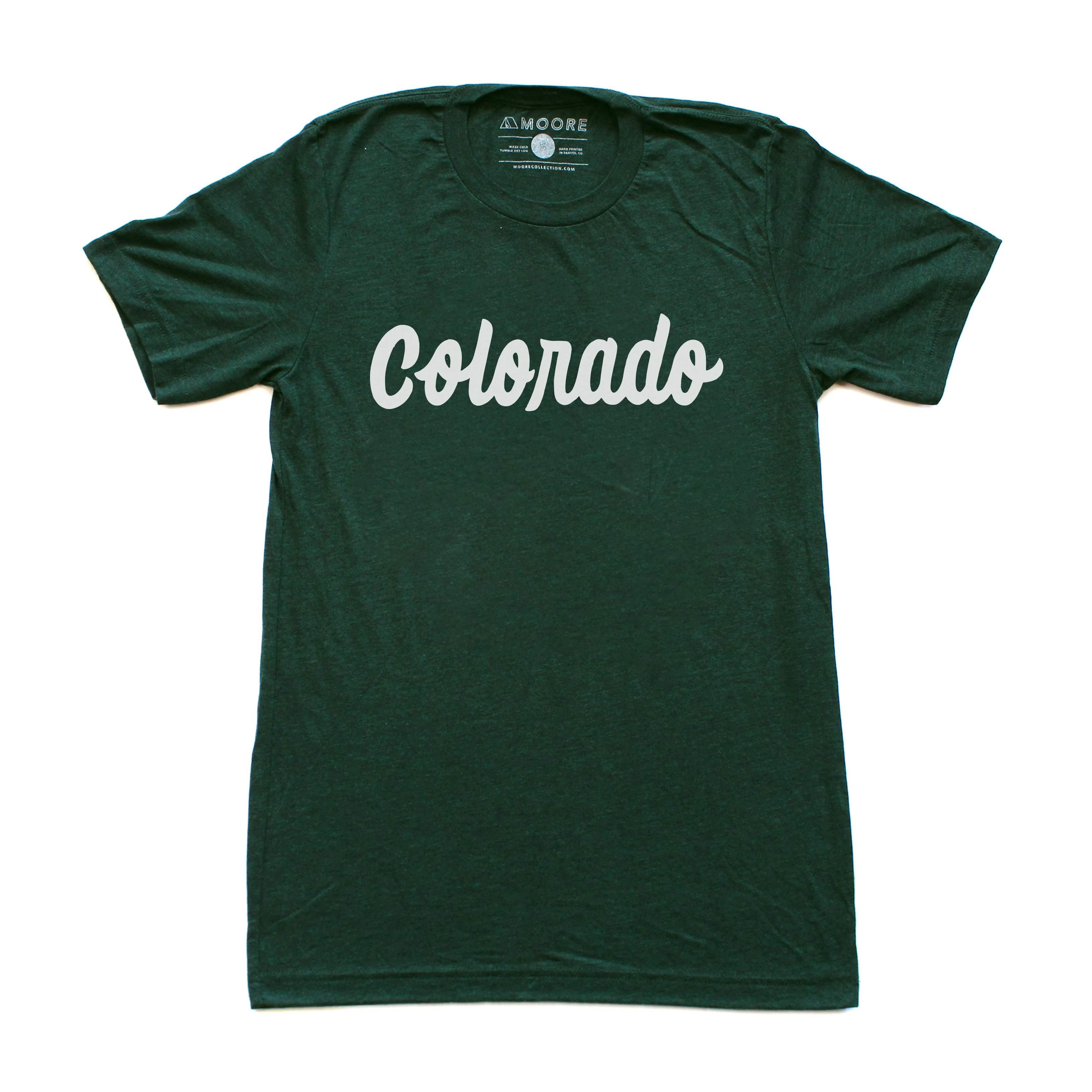 Emerald green Colorado Tee featuring hand lettering design, made from soft tri-blend fabric.