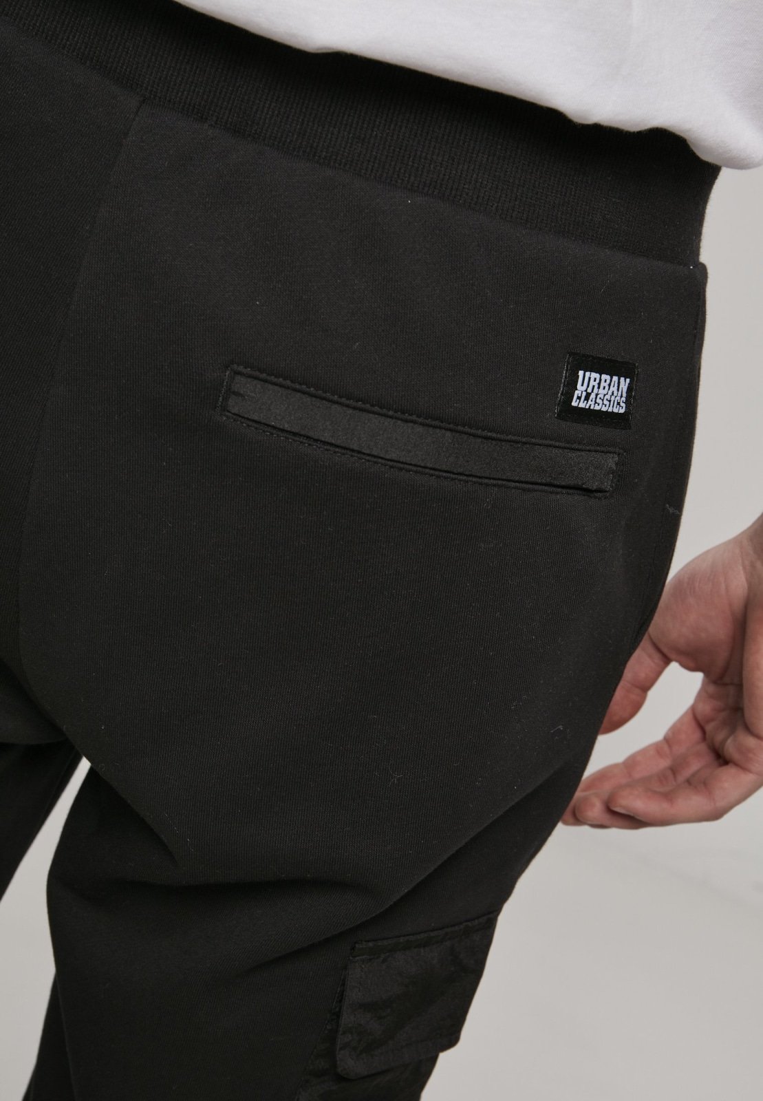 Men's Commuter Sweatpants featuring metallic nylon pockets and elastic waistband, perfect for casual wear.