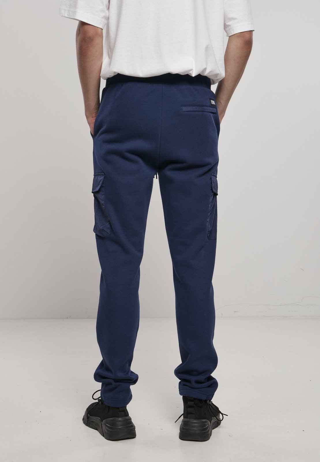 Men's Commuter Sweatpants featuring metallic nylon pockets and elastic waistband, perfect for casual wear.