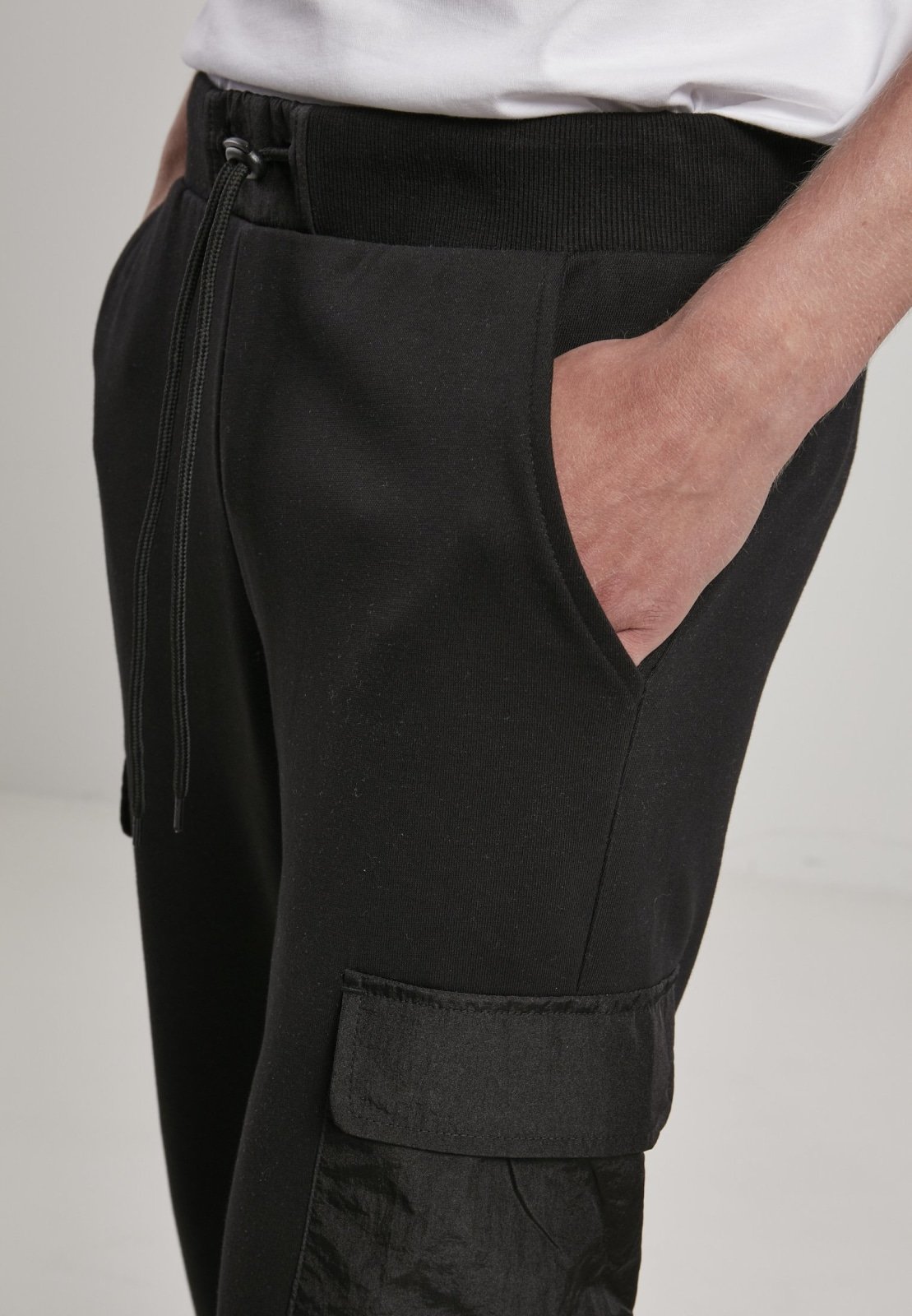 Men's Commuter Sweatpants featuring metallic nylon pockets and elastic waistband, perfect for casual wear.