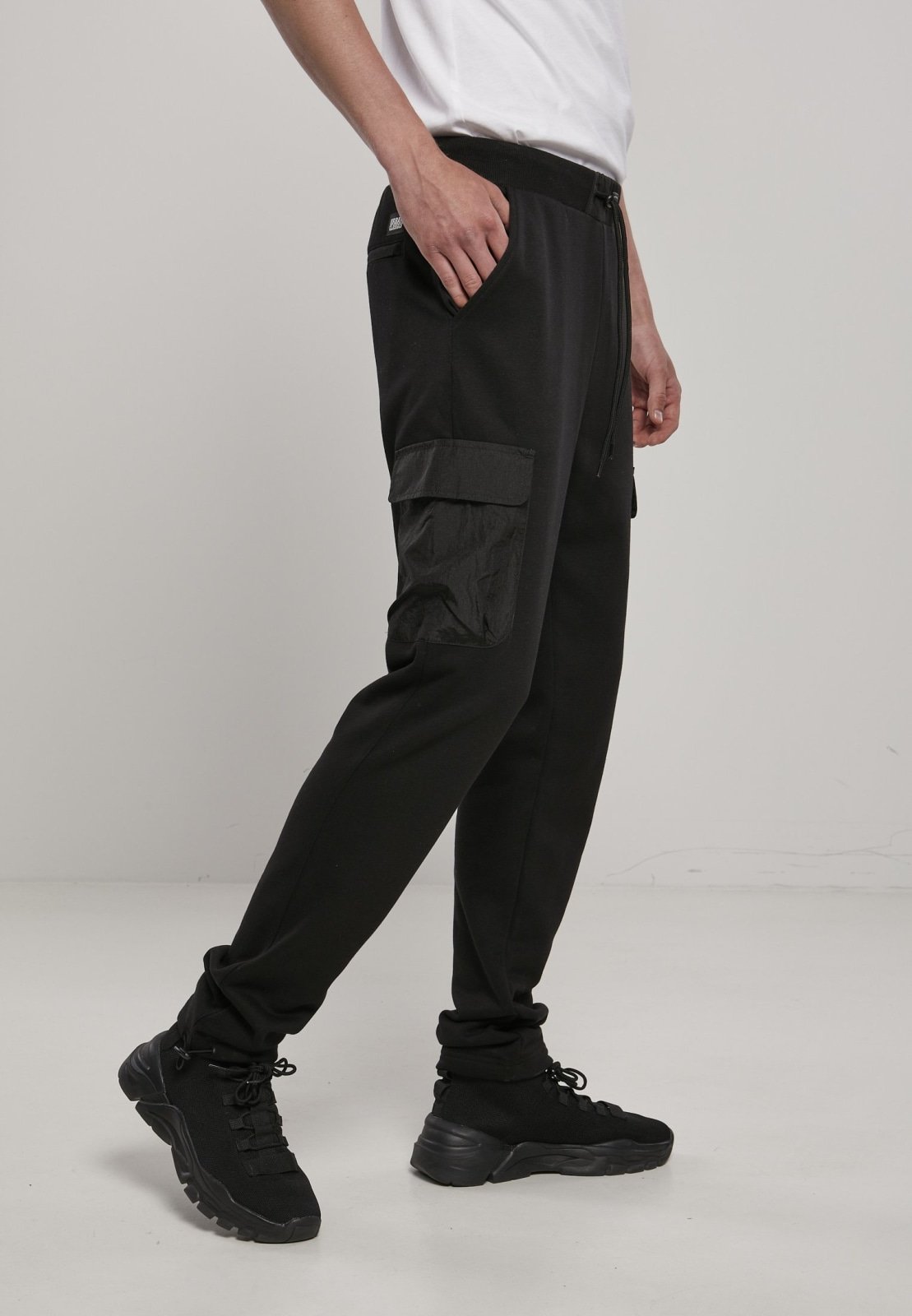 Men's Commuter Sweatpants featuring metallic nylon pockets and elastic waistband, perfect for casual wear.