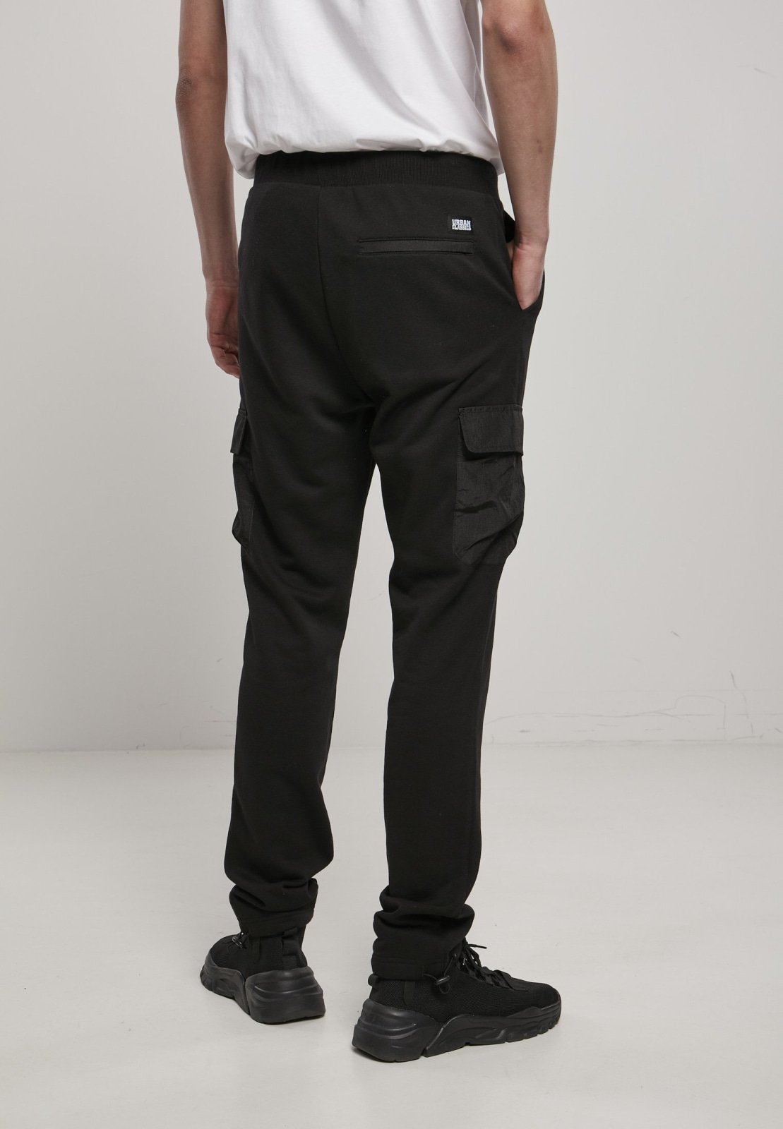 Men's Commuter Sweatpants featuring metallic nylon pockets and elastic waistband, perfect for casual wear.