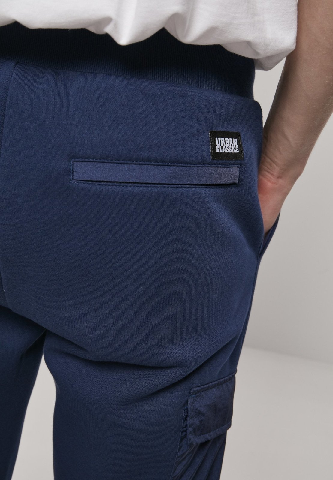 Men's Commuter Sweatpants featuring metallic nylon pockets and elastic waistband, perfect for casual wear.