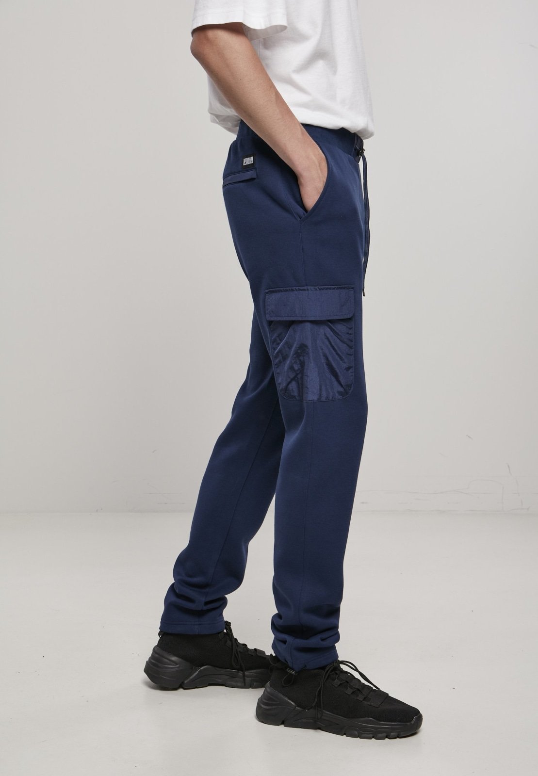 Men's Commuter Sweatpants featuring metallic nylon pockets and elastic waistband, perfect for casual wear.