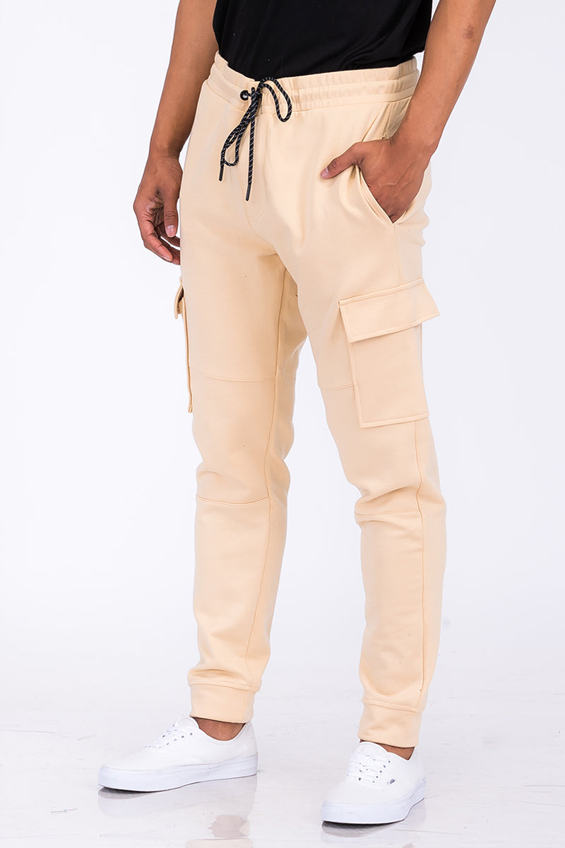 A pair of stylish Cotton Blend Cargo Joggers featuring side cargo pockets, elastic waist with drawstring, and a comfortable fit.