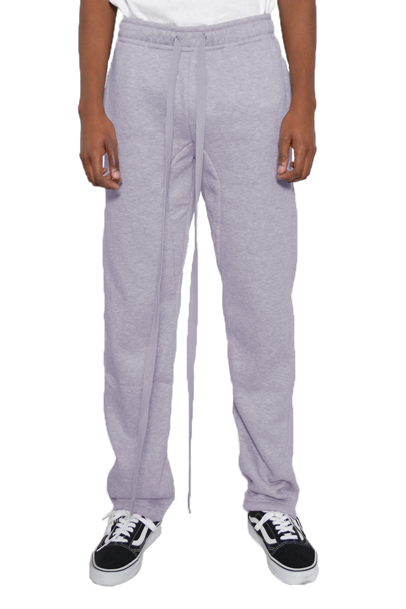 Cotton fleece toggle sweats featuring elastic waist and ankle, perfect for gym or casual wear.