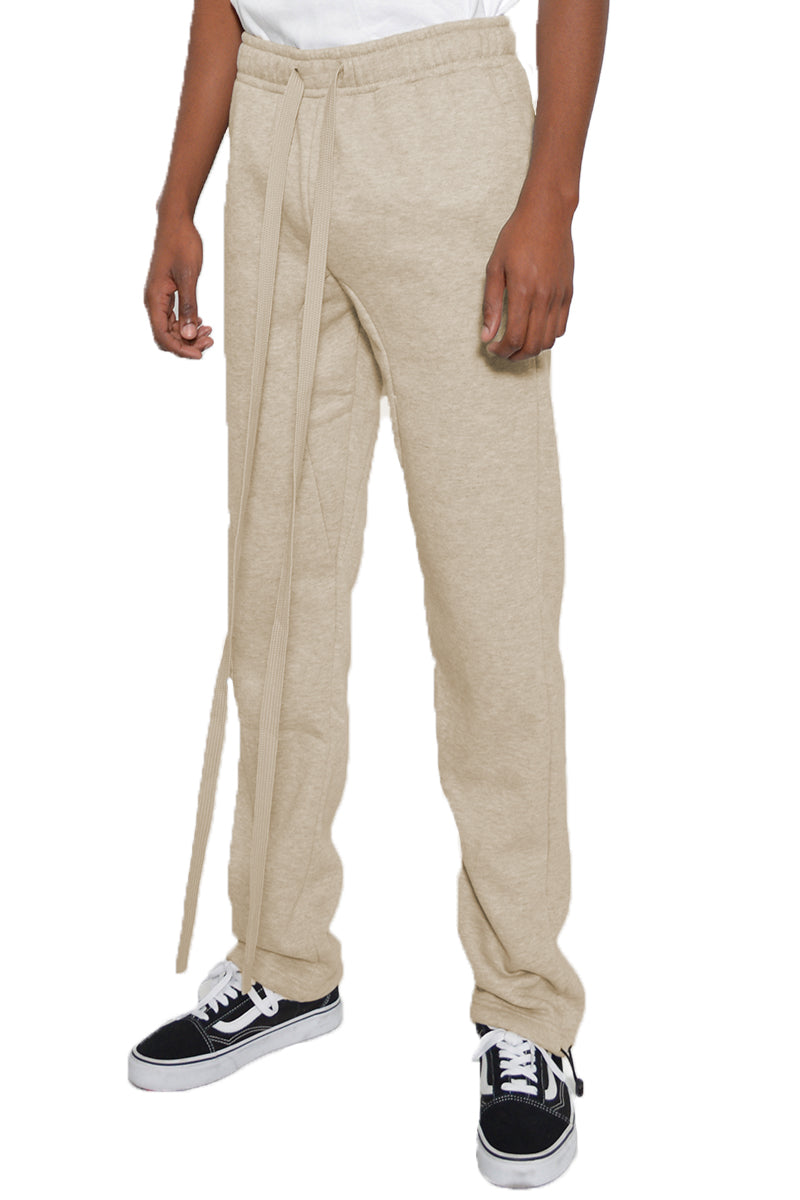 Cotton Fleece Toggle Sweats in a casual setting, showcasing elastic waist and ankle toggle.