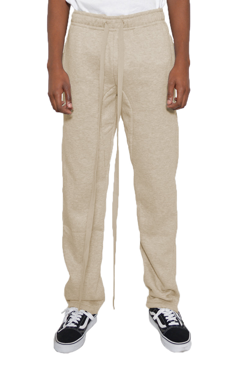 Cotton Fleece Toggle Sweats in a casual setting, showcasing elastic waist and ankle toggle.