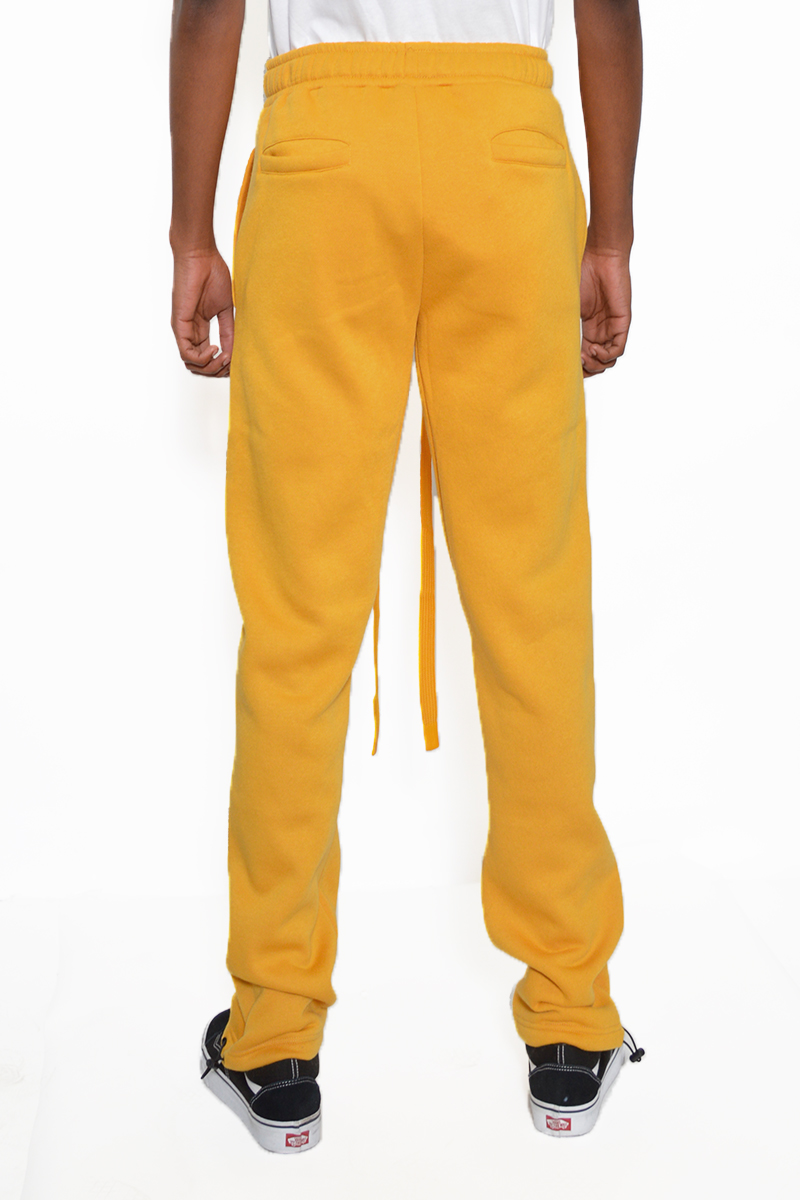 Cotton Fleece Toggle Sweats featuring elastic waist and ankle toggle, perfect for casual and active wear.