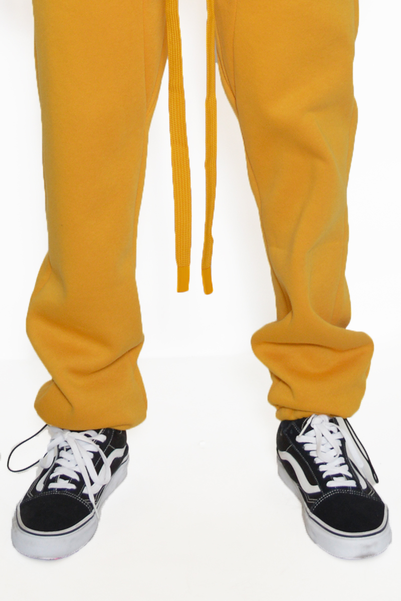 Cotton Fleece Toggle Sweats featuring elastic waist and ankle toggle, perfect for casual and active wear.