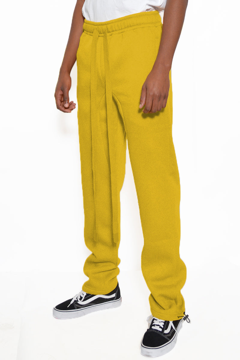 Cotton Fleece Toggle Sweats in a casual setting, showcasing elastic waist and ankle toggle.