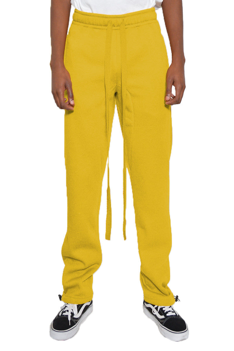 Cotton Fleece Toggle Sweats in a casual setting, showcasing elastic waist and ankle toggle.