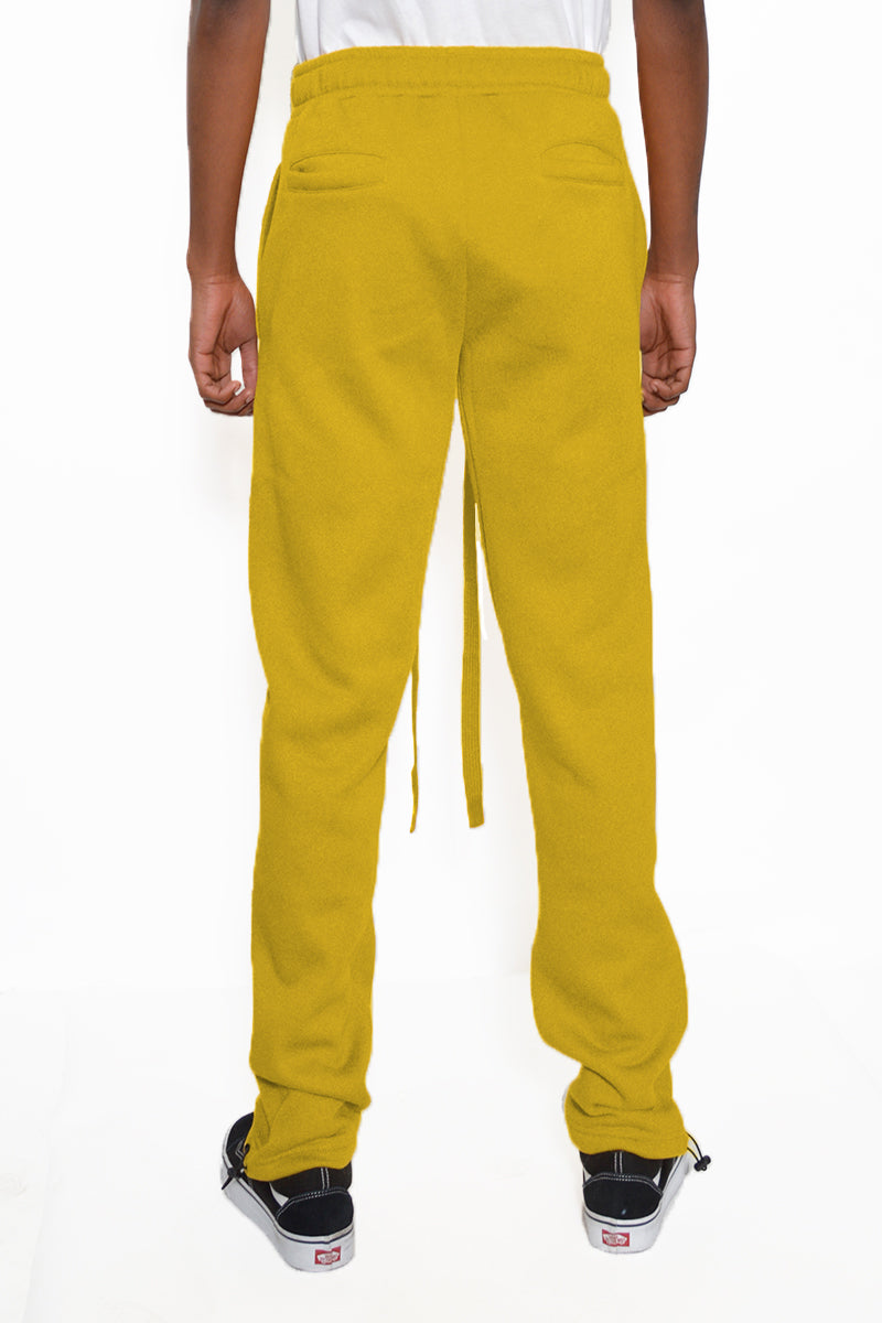 Cotton Fleece Toggle Sweats in a casual setting, showcasing elastic waist and ankle toggle.