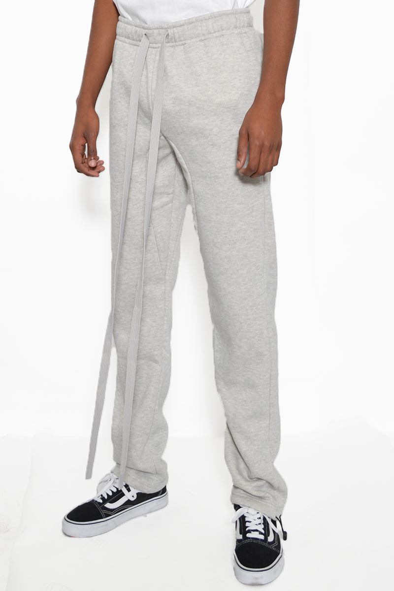 Cotton Fleece Toggle Sweats in a casual setting, showcasing the elastic waist and toggle ankle design.