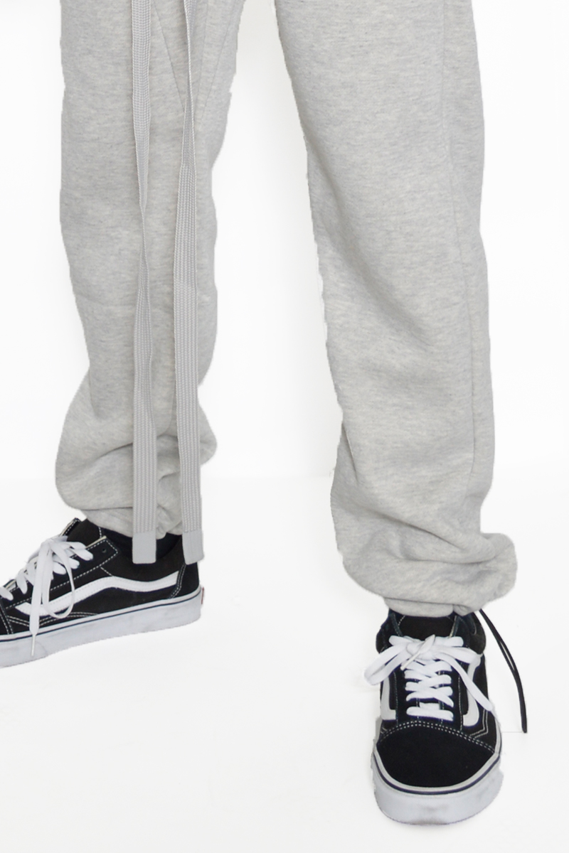 Cotton Fleece Toggle Sweats in a casual setting, showcasing the elastic waist and toggle ankle design.