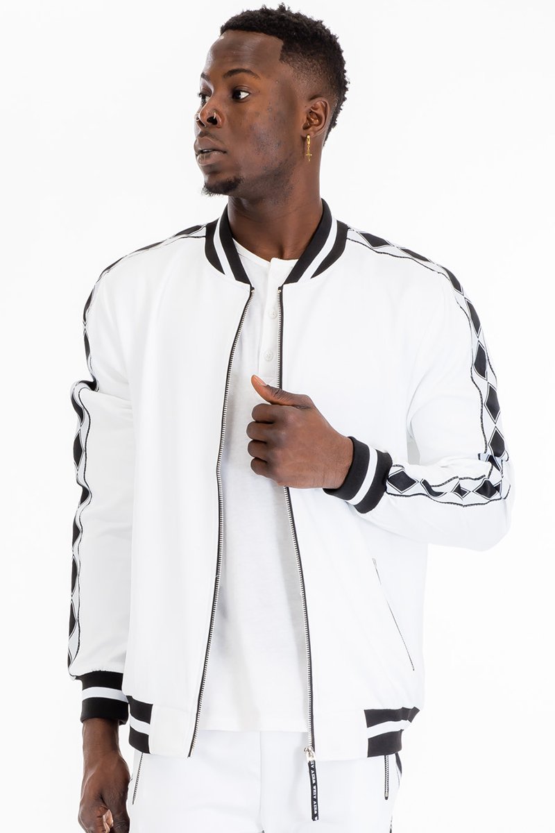 A stylish Diamond Tape Track Jacket featuring a diamond design tape on the sides, ribbed cuffs, and collar, perfect for casual and athletic wear.