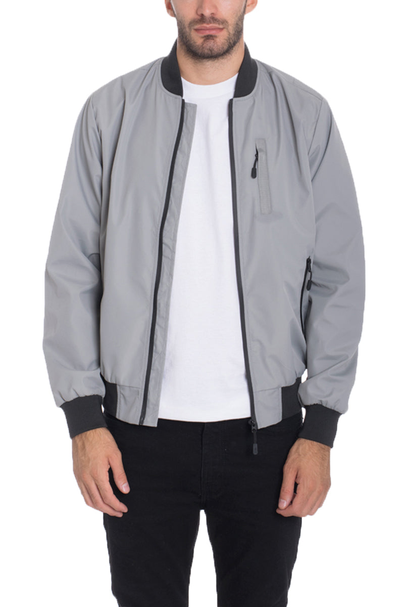 Dimple Bomber Jacket displayed on a model, showcasing its stylish design and front zip fastening.