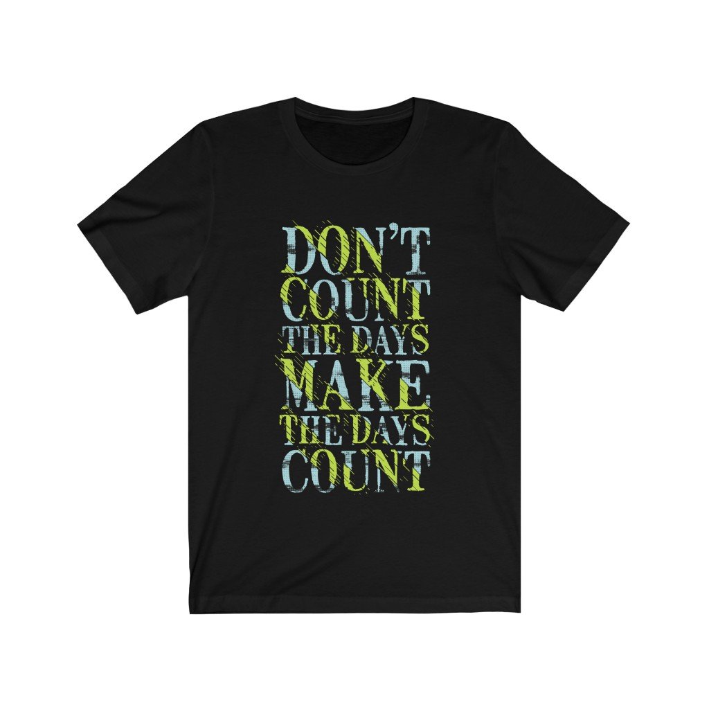 A soft cotton unisex t-shirt featuring the motivational phrase 'Don't Count the Days', available in various sizes.