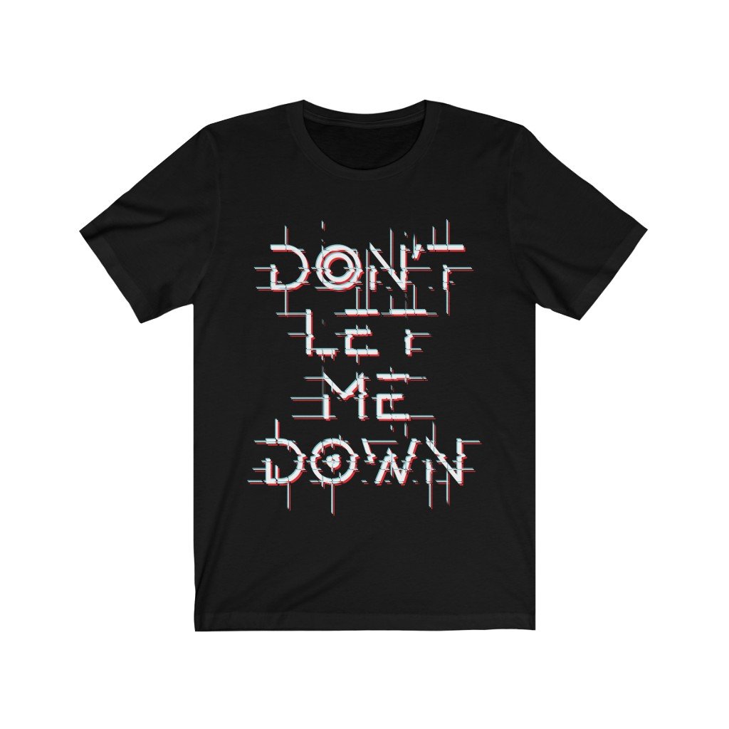 A soft cotton unisex t-shirt featuring the phrase 'Don't Let Me Down' in a stylish font, available in various colors.