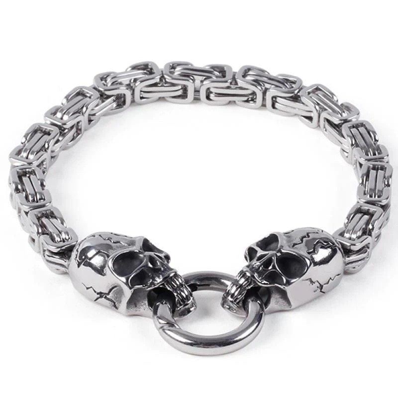 A stylish Double Wolf Head Bracelet featuring two intricately designed wolf heads, made from durable alloy with a secure spring-ring clasp.