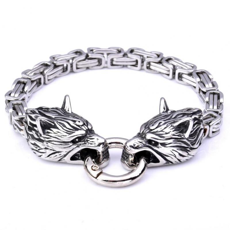 A stylish Double Wolf Head Bracelet featuring two intricately designed wolf heads, made from durable alloy with a secure spring-ring clasp.