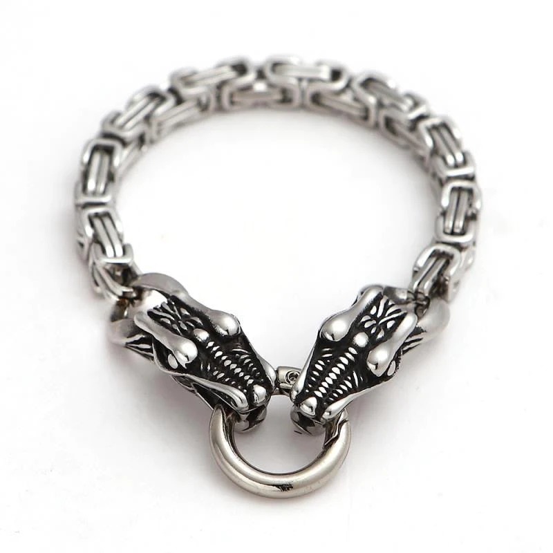 A stylish Double Wolf Head Bracelet featuring two intricately designed wolf heads, made from durable alloy with a secure spring-ring clasp.