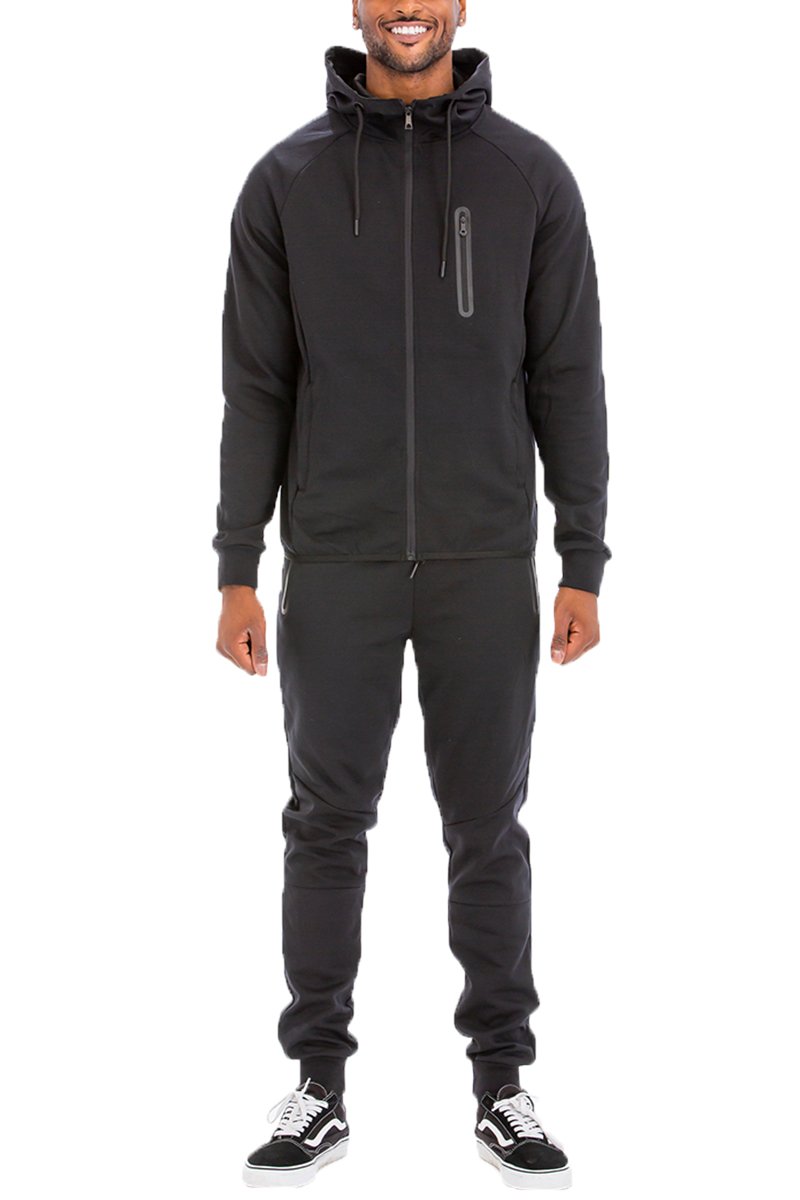 Dynamic Solid Sweat Set featuring a hooded top and elastic waist pants, designed for comfort and style.