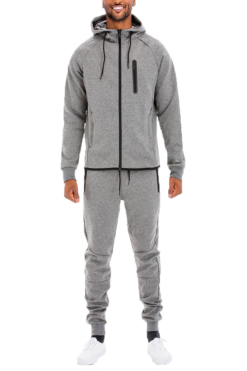 Dynamic Solid Sweat Set featuring a hooded top and elastic waist pants, designed for comfort and style.