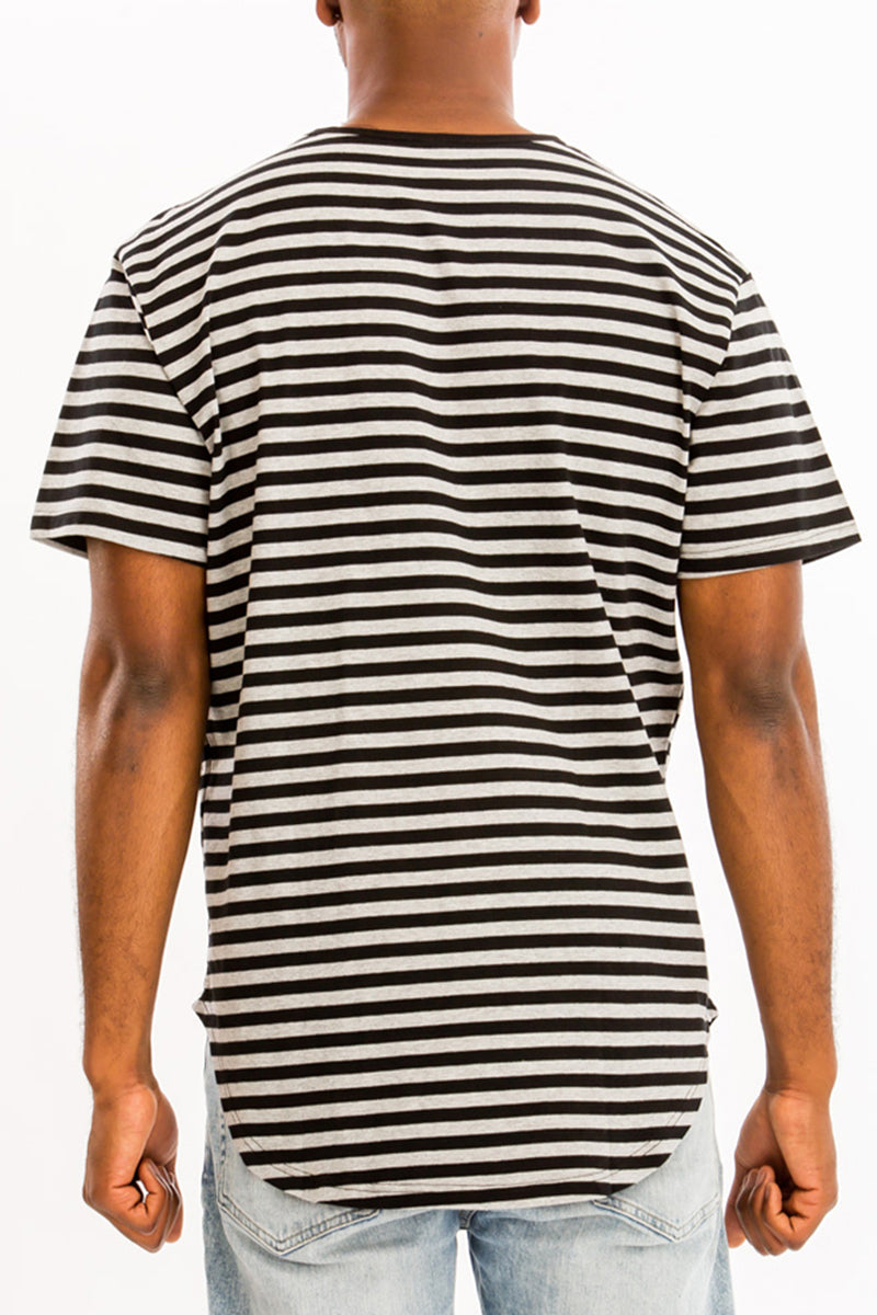 Edwin Striped Tee featuring an oversized fit, made from 97% cotton and 3% spandex, displayed on a model.